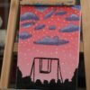 Swing under a pink sky